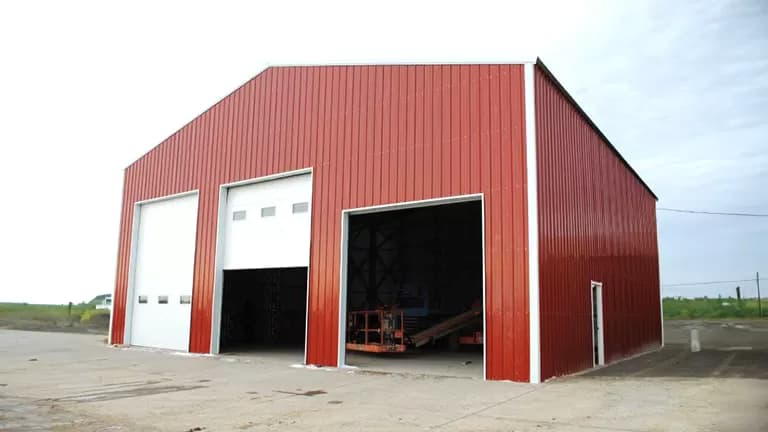 50x50x18 Fully Enclosed Clear Span All Vertical — 50'W x 50'L metal building from Get Carports